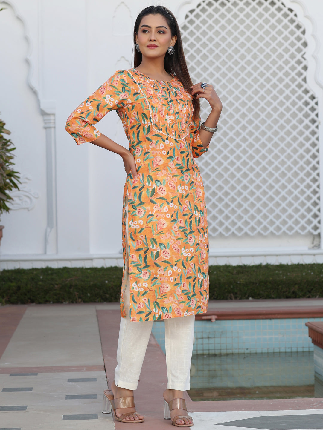 A Orange Floral Digital Print Slub Kurta With Pintucks And Sequence Embelished In Yoke And Lace Detailings