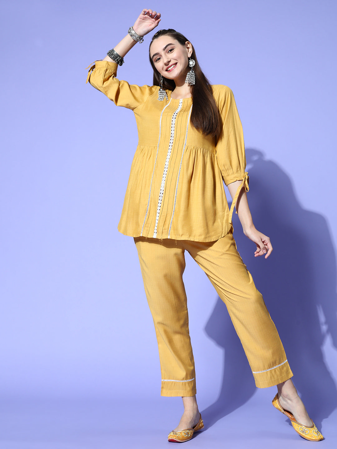 A Mustard Self Weave Rayon Co-Ord Set With A Round Neck Laced Top And A Solid Mustard Self Weave Rayon Pant