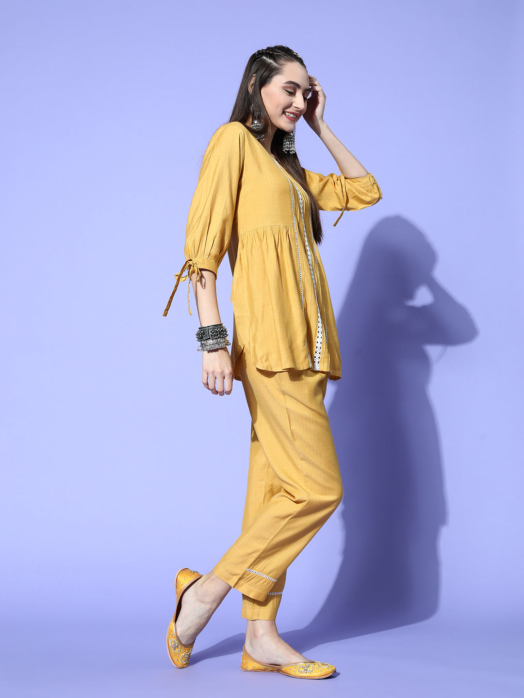 A Mustard Self Weave Rayon Co-Ord Set With A Round Neck Laced Top And A Solid Mustard Self Weave Rayon Pant