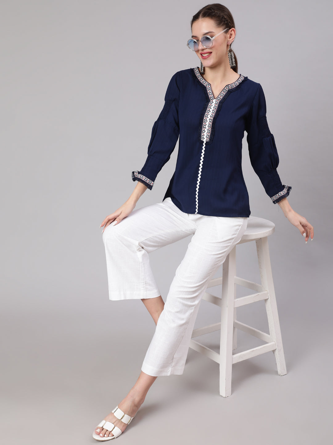 A Blue Poly Silk Lace Embellished Top With Smocked Sleeves With Wide-Leg White Pants