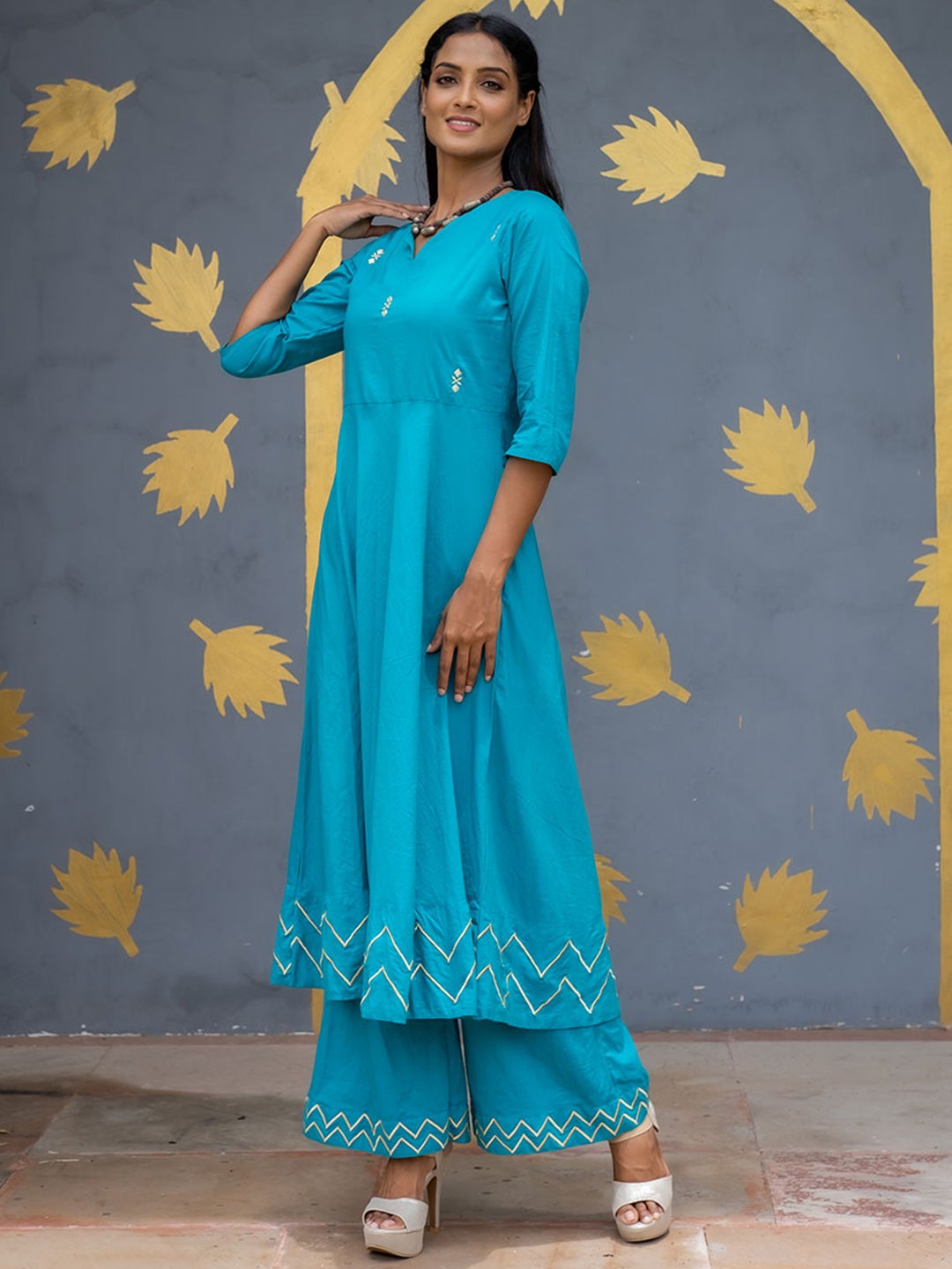 Turquoise Solid Embroidered Cotton Flared Kurta with Palazzos