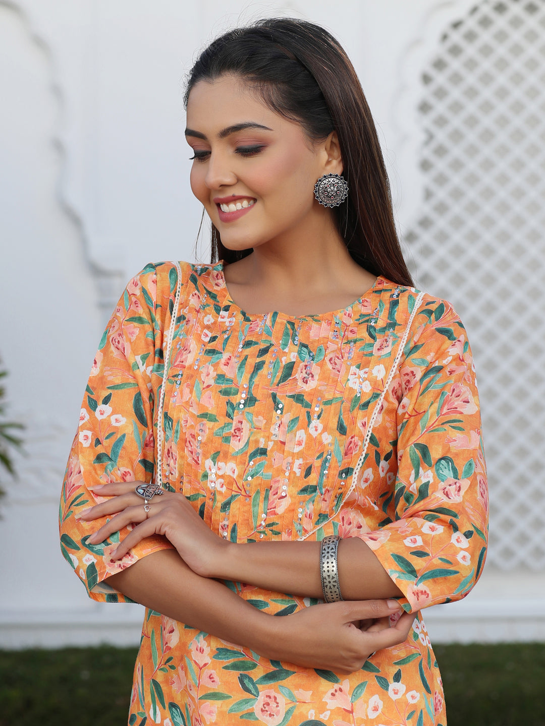 A Orange Floral Digital Print Slub Kurta With Pintucks And Sequence Embelished In Yoke And Lace Detailings