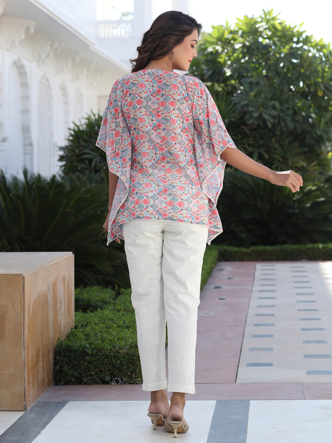 A Peach Geometric Printed Georgette Kaftan Top With Pintucks And Lace Details At The Yoke