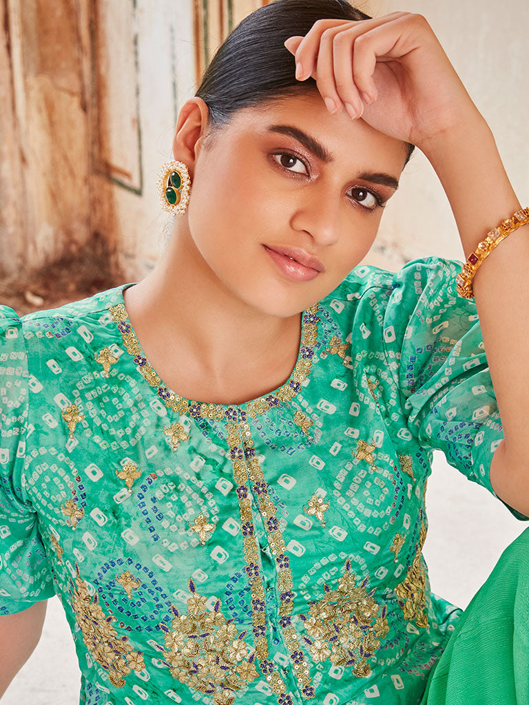 Embellished Green Muslin Bhandej Peplum Top With Chinon Flared Divider