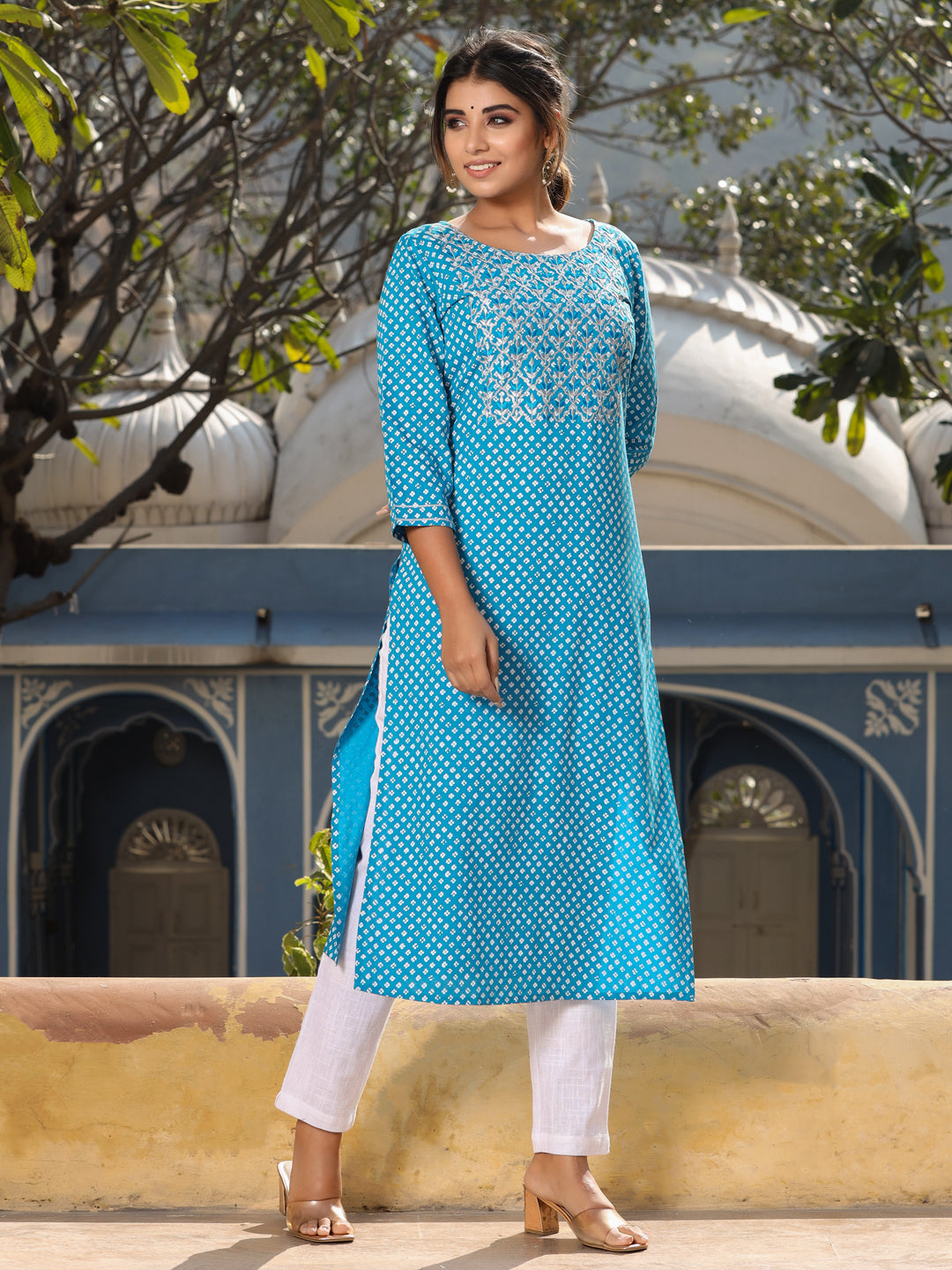 Turquoise blue ethnic printed straight kurta with embroidered yoke