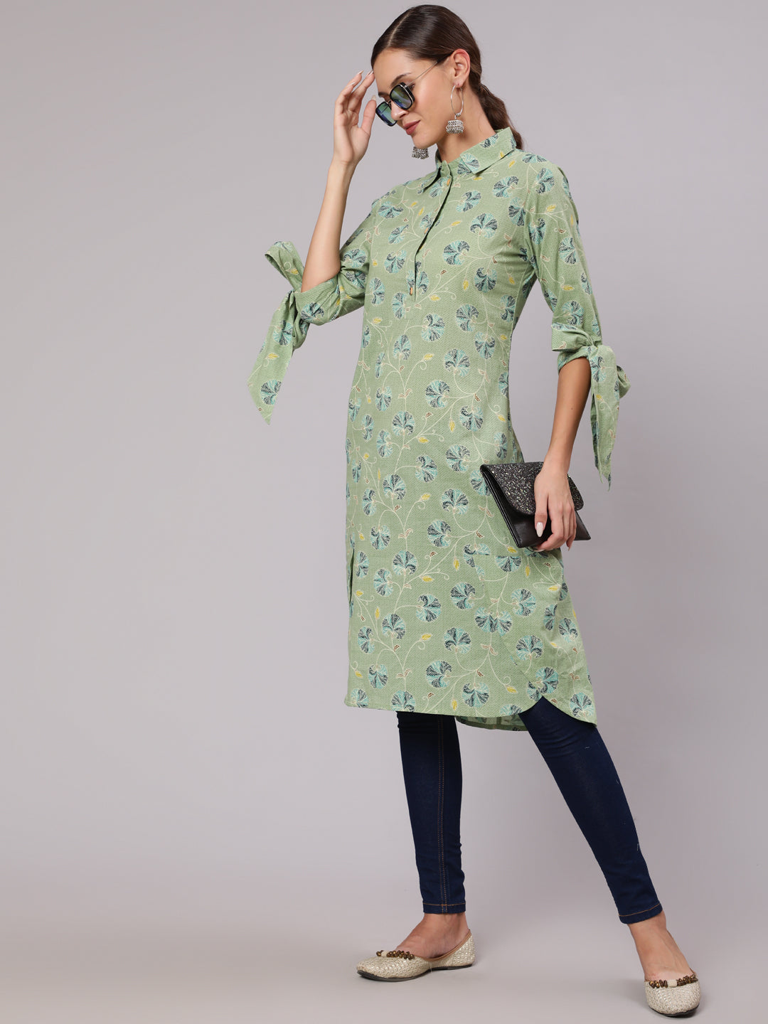 A Green Floral Cotton Printed Kurta With Tie-Up Sleeves And High-Low Hemline