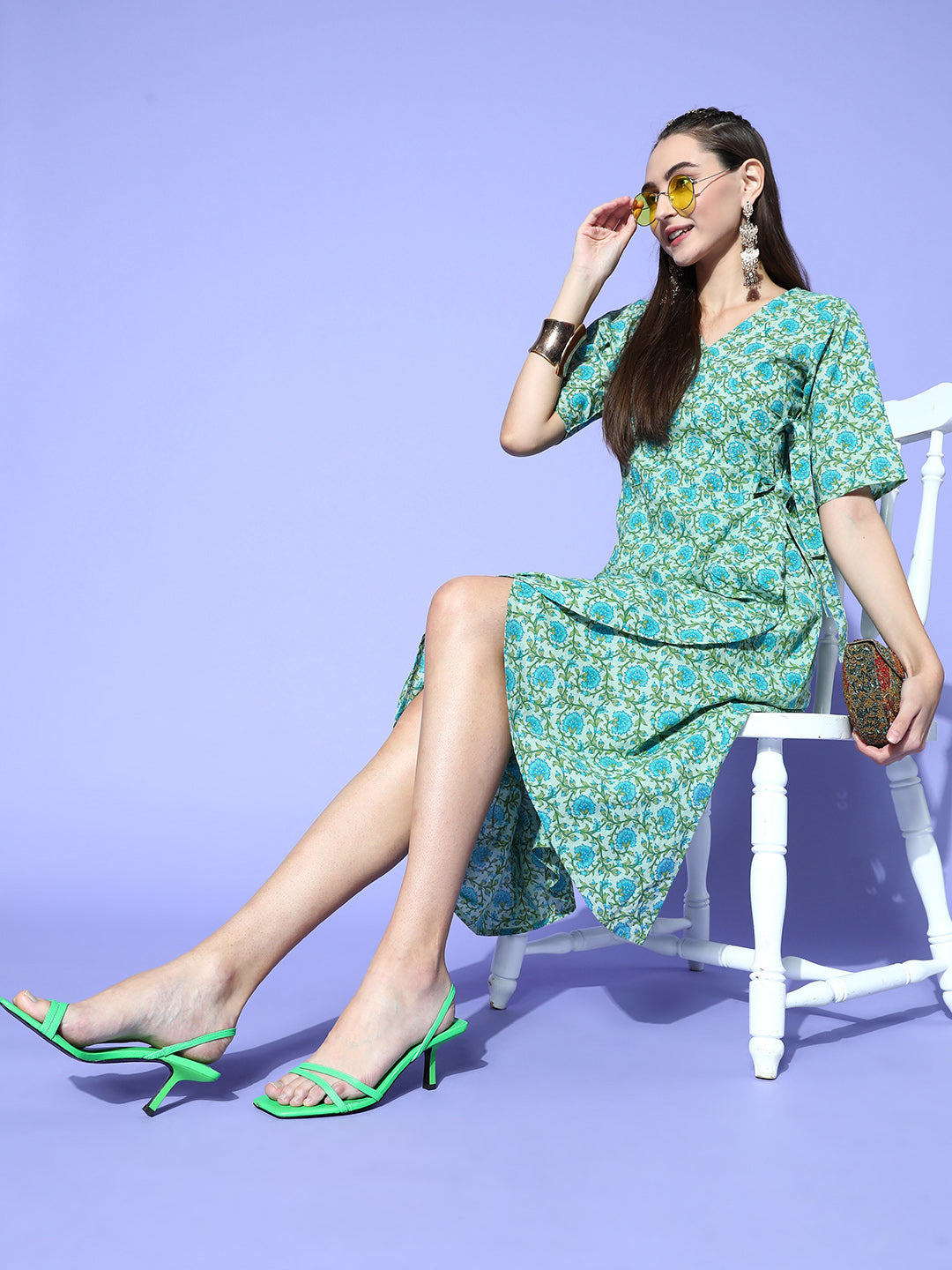 A Green Floral Cotton Embroidered Flared Dress With Short Sleeves And Tie-Up Belt