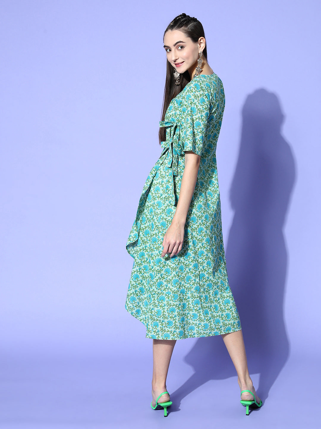 A Green Floral Cotton Embroidered Flared Dress With Short Sleeves And Tie-Up Belt