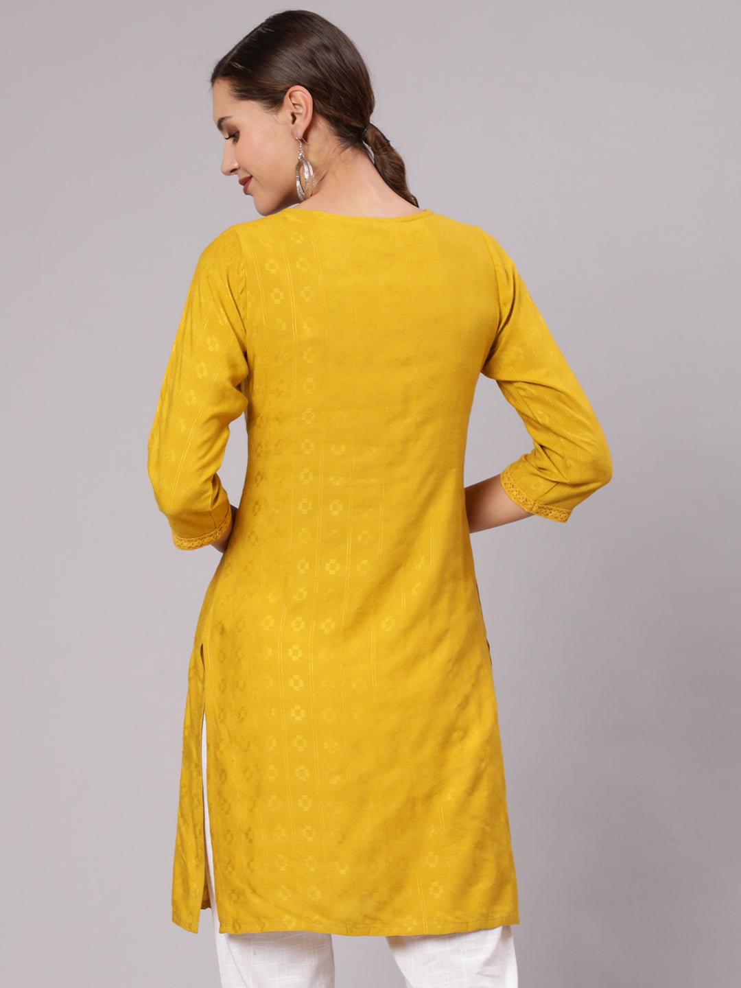 Mustard Self Weave Pleated, Laced-Up And Gathered Short Kurta With Tassels
