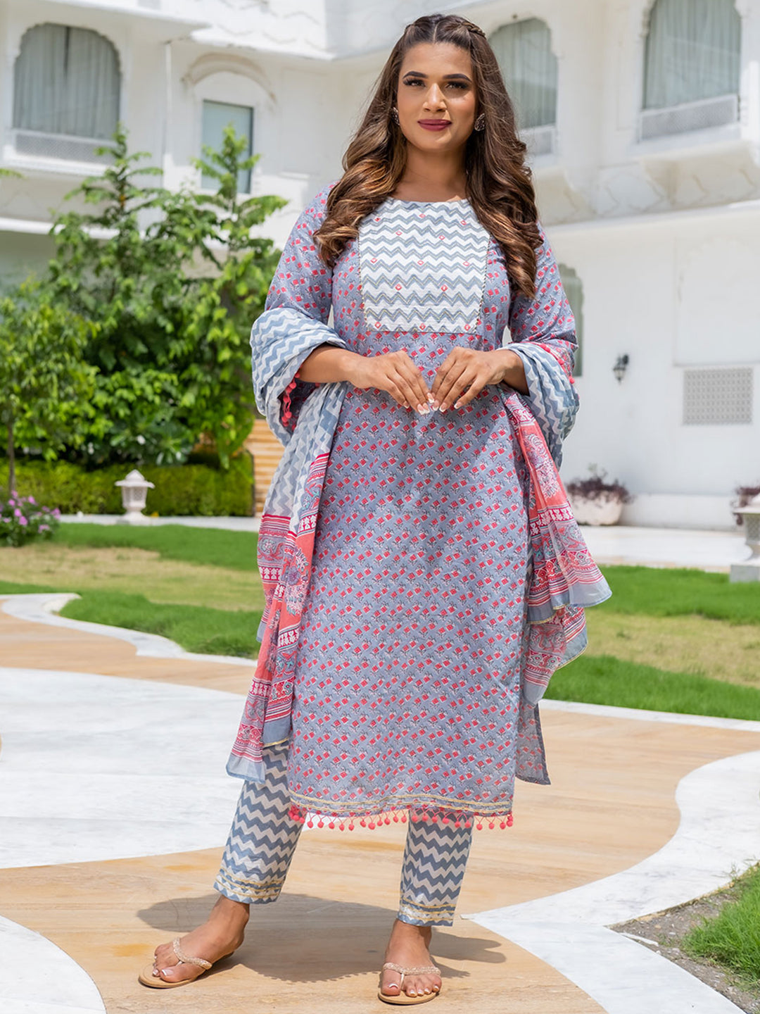 A Straight Ethnic Printed Mirror Work Kurta With Printed Pants And Dupatta