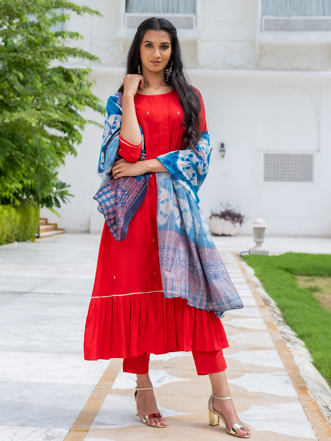 A Red Silk Flared Kurta With Pants And Dupatta