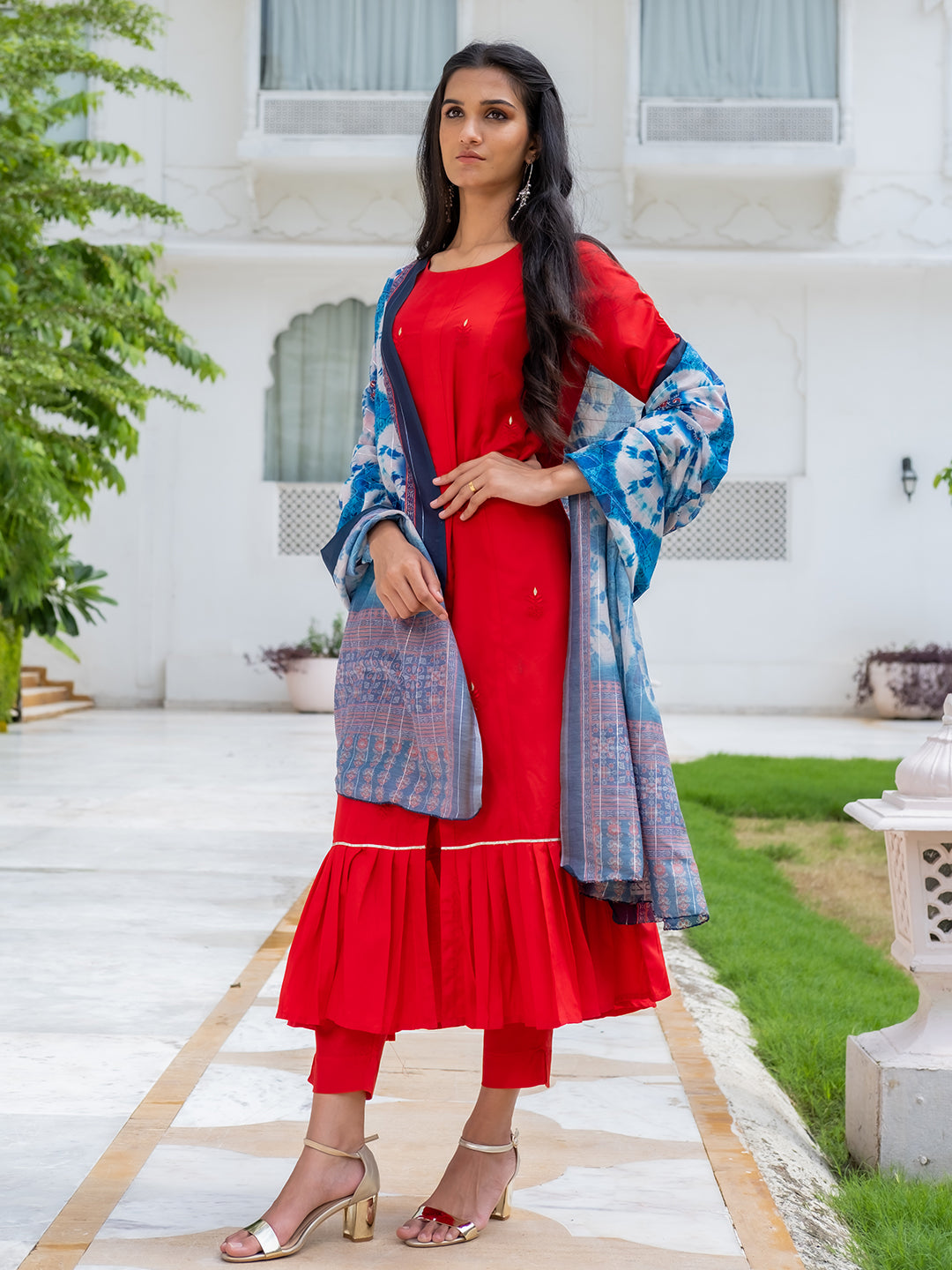 A Red Silk Flared Kurta With Pants And Dupatta