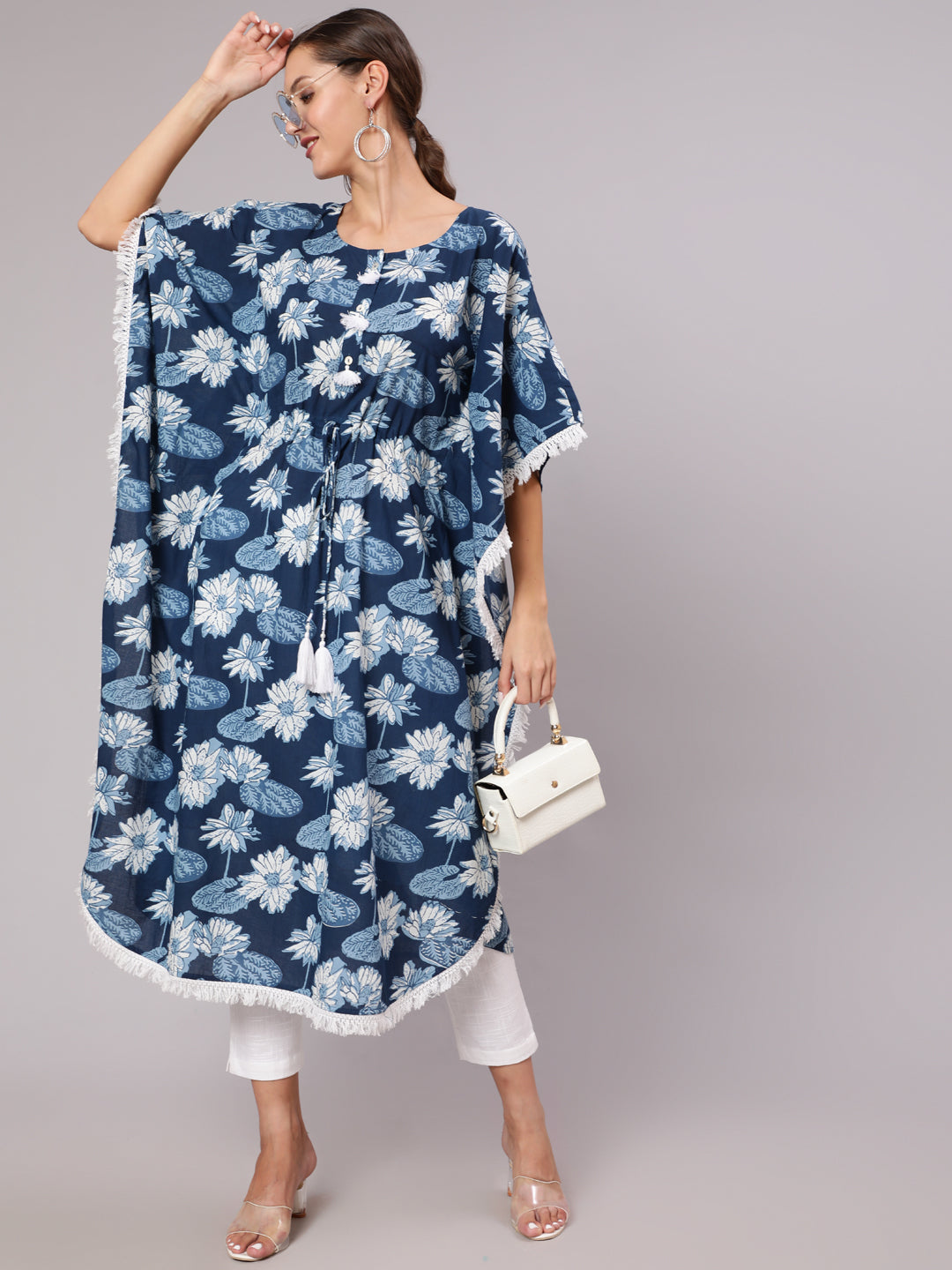 A Blue Color Cotton Pigment Floral Printed Kaftan With With Laced Embellishments Paired With Solid White Pants