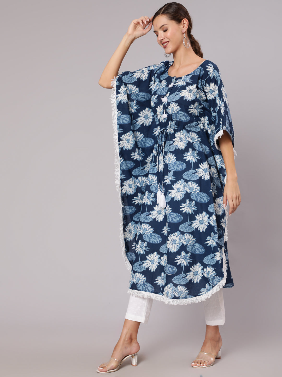 A Blue Color Cotton Pigment Floral Printed Kaftan With With Laced Embellishments Paired With Solid White Pants