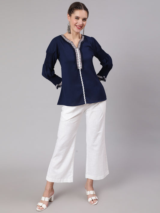 A Blue Poly Silk Lace Embellished Top With Smocked Sleeves With Wide-Leg White Pants