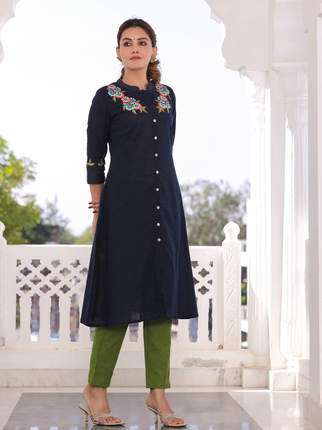 Navy blue embroidered a line kurta With Solid Cotton Slub pant.